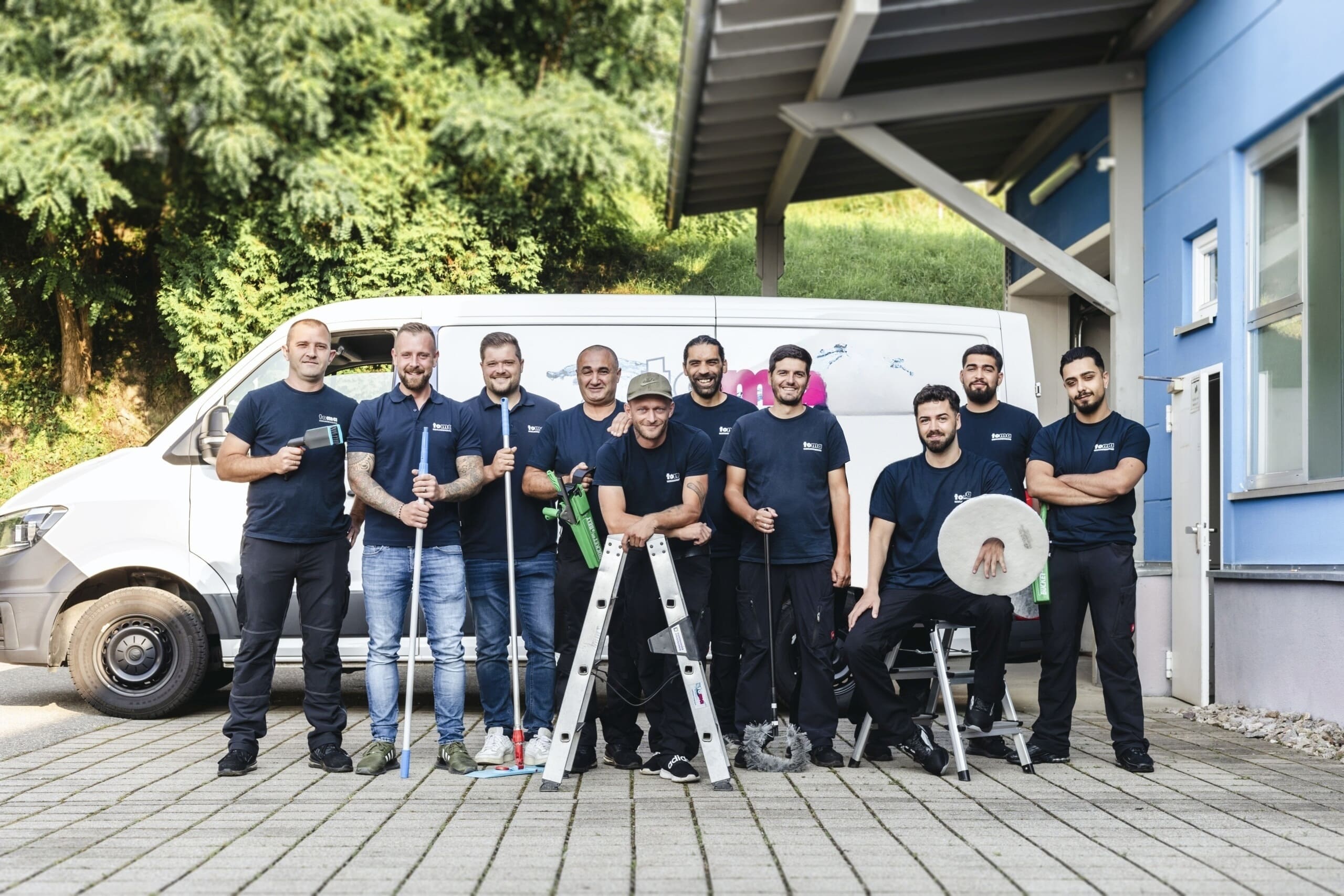 Bild der toma Mitarbeiter